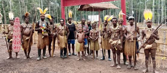 Group of Indigenous Awyu in traditional clothing