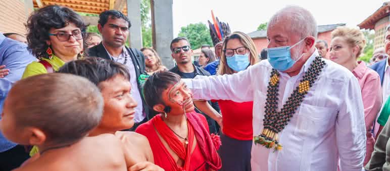 President Lula da Silva speaking with affected Yanomami at a temporary health camp in Boa Vista, Roraima, on Jan. 21, 2023 Brazilian President Lula da Silva speaking with Yanomami people