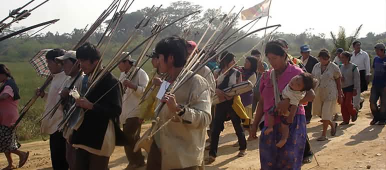 Indians on their protest march Bolivian Indians walking their protest march with arrow and bow in their hands