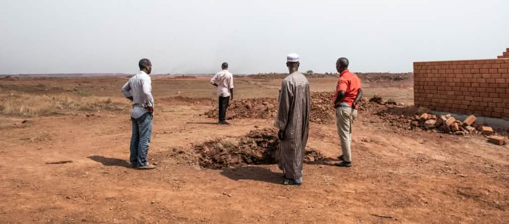 Scorched earth: Villagers at the Sangaredi bauxite mine Hamdallaye villagers at the Sangaredi bauxite mine