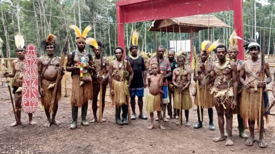 Group of Indigenous Awyu in traditional clothing