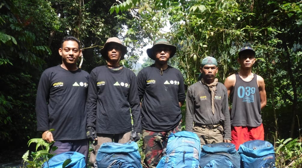 Five rangers with blue backpacks