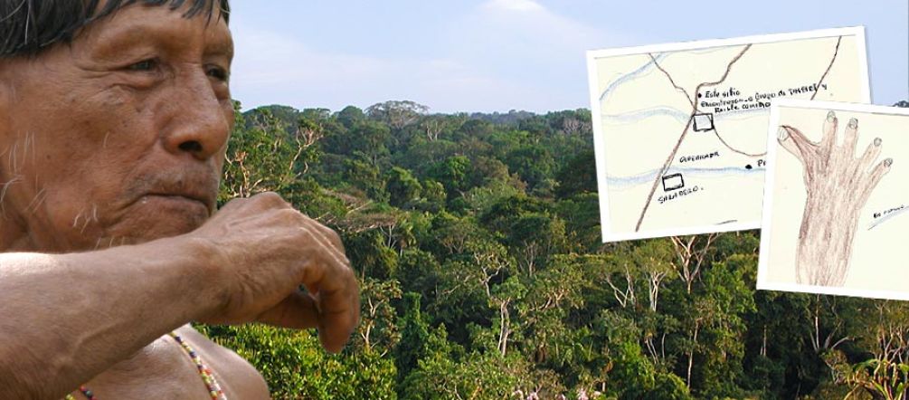 The last rainforest dwellers living in voluntary isolation are in danger. Indigenous man in front of rainforest